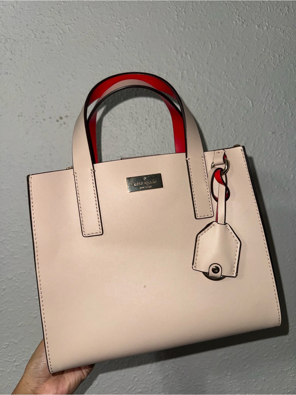 kate spade beige bag with red interior
